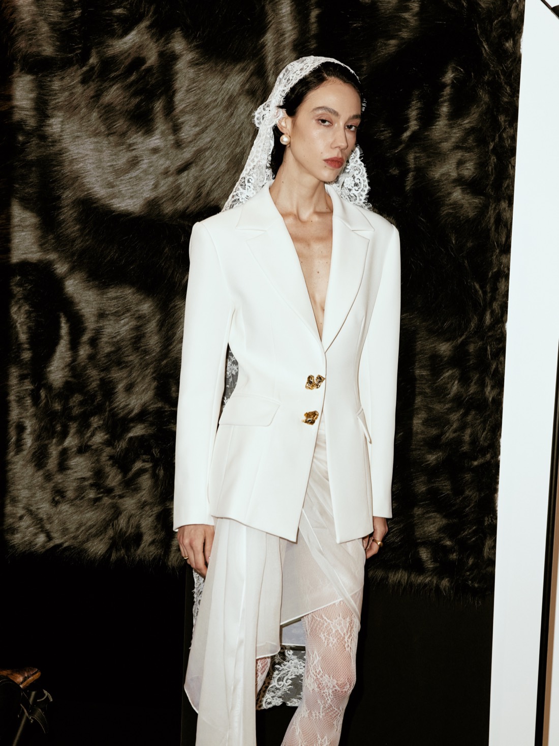 Lichée Bridal SS26 — tailored white bridal suit, three-quarter view